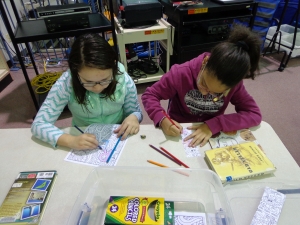 4th_Library_centers_3 Students enjoying the fourth grade centers in the library.