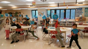 Peacocks_2 Kindergarten made peacocks in the library after comparing fiction to non-fiction.